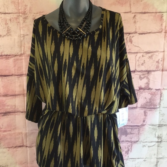 LuLaRoe Tops - 2XL Irma with splash of black & green tribal.